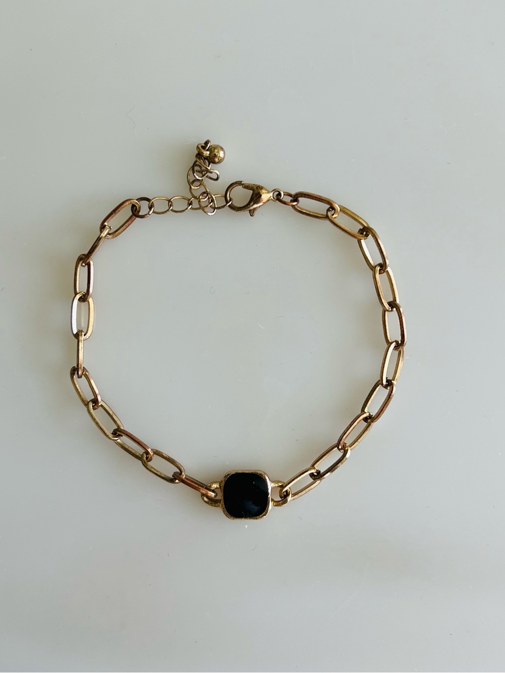 Gold Link Bracelet with Black Stone Accent